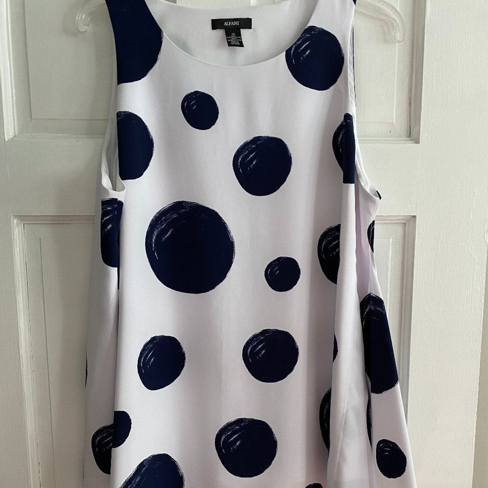 ALFANI white and large blue polka dot tunic-style top.